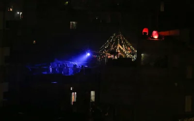 People celebrate new years on the roof tops of their homes in Dhaka on Wednesday, January 1, 2020 Mahmud Hossain Opu/Dhaka Tribune