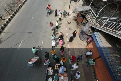 Few people wait in line in front of TCB truck sale at Shahbag on Tuesday, March 31, 2020  Mahmud Hossain Opu/Dhaka Tribune