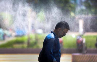 A man walks through a disinfection gate before  entering a hospital during coronavirus pandemic in Dhaka. April 16, 2020 Mahmud Hossain Opu/Dhaka Tribune