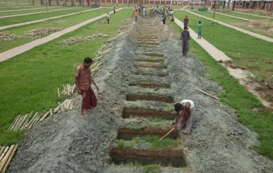 A line of graves being prepared for the ones killed in the Rana Plaza accident Syed Zakir Hossain/Dhaka Tribune
