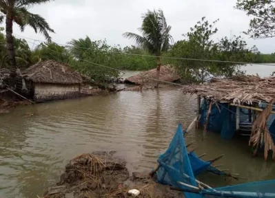 Several feet of storm surge have completely inundated houses in Paikgachha upazila, Khulna. Photo taken on Thursday, May 21, 2020 | Dhaka Tribune