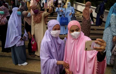 Muslims celebrate Eid al-Fitr, the Muslim festival marking the end of the holy fasting month of Ramadan, at the Thai Islamic Center amid the spread of the coronavirus disease (COVID-19) outbreak in Bangkok, Thailand, May 24, 2020 Reuters