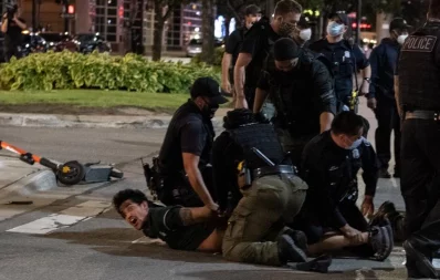 US Detroit police officers detain a man during a demonstration over the death of George Floyd, a black man who died after a white policeman knelt on his neck for several minutes in the city of Detroit, Michigan, on May 29, 2020nAFP