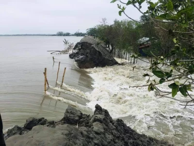 Storm surge rushes into a village in Satkhira, destroying a road, following Cyclone Amphan. Photo taken on Thursday, May 21, 2020 | Dhaka Tribune