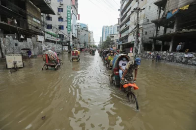 Rickshaws on submerged road at Green Road area in Dhaka on Monday, July 20, 2020 | Rajib Dhar/Dhaka Tribune