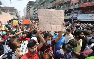 Several hundred shop owners and employees stage a demonstration for the second day at Dhakau2019s Nilkhet area, protesting the governments decision to shut down all shopping malls and markets during the weeklong lockdown Mahmud Hossain Opu/Dhaka Tribune