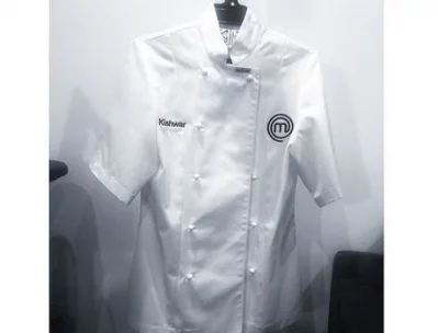 Kishwar decides to take a photo of her suit before heading to the kitchen for grand finale