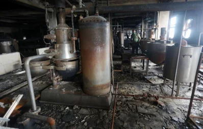 Aftermath of Narayanganj factory fire as firefighters work to put out small fires that reignited from embers in the debris Mehedi Hasan/Dhaka Tribune