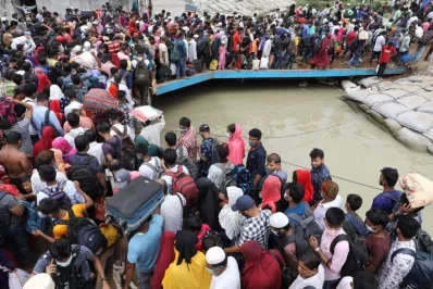 In pictures: RMG workers rush towards Dhaka as fear of losing jobs trumps Covid