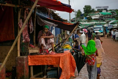 A vendor sells meat at a Rohingya refugee camp in Coxs Bazar, Bangladesh, on Wednesday, August 11, 2021 Allison Joyce/Dhaka Tribune