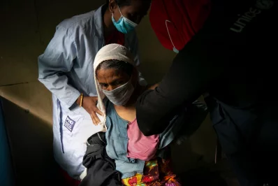 A Rohingya woman being inoculated against Covid-19 at a refugee camp in Coxs Bazar, Bangladesh, on Wednesday, August 11, 2021 Allison Joyce/Dhaka Tribune