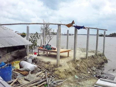 Cyclone Amphan - This photo is from Gabura, Sathkhira after the cyclone Amphan. The old womans house used to be where she was lying down, but due to the cyclone, she lost most of her valuable possessions. With nothing to look forward to and no hope, she lies down on what remains of possession.