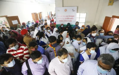 Students line up for the first dose of Pfizer vaccine at the Ideal School and College centre in Dhakas Motijheel where inoculation of school students aged 12-17 took off on Monday, November 1, 2021 Mehedi Hasan/Dhaka Tribune