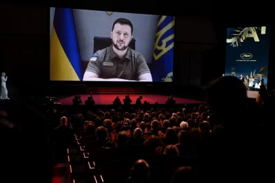 Ukrainian President Volodymyr Zelensky addresses guests during the Opening Ceremony of the 75th edition of the Cannes Film Festival in Cannes, southern France, on May 17, 2022 AFP
