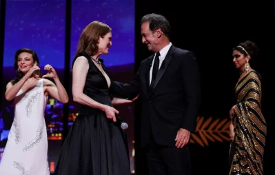 US actress Julianne Moore (L) smiles next to French actor and President of the Jury of the 75th Cannes Film Festival Vincent Lindon during the Opening Ceremony of the 75th edition of the Cannes Film Festival in Cannes, southern France, on May 17, 2022 AFP