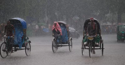 In Pictures: Rain brings relief to Dhaka dwellers
