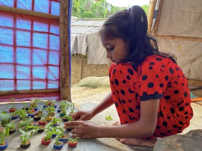 Nur Asma loves nature and cares for the earth. She collected all these water bottle tops to plant trees Ishrat Fori Imran 2022