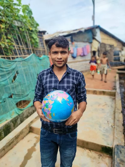 Emdadul Hassan is 21 years old, he lives in camp 3 and works as a humanitarian volunteer with Plan International. u2018Our planet is like an umbrella. When it rains the umbrella doesnt care if the person under is black, white or brown. Planet Earth is meant for all living beings to share a good and peaceful life.u2019 Md Iddris 2022