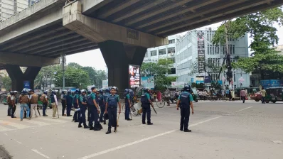 Police block a street during an absentee funeral prayer for Delawar Hossain Sayedee in Chittagong, on Tuesday, August 15, 2023. Photo: Dhaka Tribune