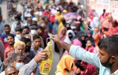 The photo shows people waiting in line to buy products from a mobile truck of the Trading Corporation of Bangladesh (TCB). Photo: Dhaka Tribune