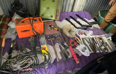 The image shows weapons and arms manufacturing equipment being seized during a raid on an illegal weapons production facility in Chittagong, on Tuesday, August 23, 2023. Photo: Dhaka Tribune