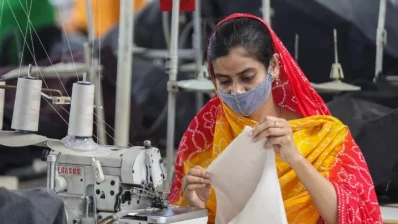 The undated file image shows a female garment worker working in a garment factory. Photo: Collected