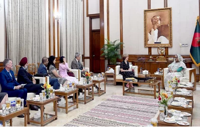Members of the delegation of International Republican Institute (IRI) and National Democratic Institute (NDI) pre-election assessment mission (PEAM) from the US pays a courtesy call on her at the PM`s official residence Ganabhaban in the capital on Wednesday, October 11, 2023. Photo: PID