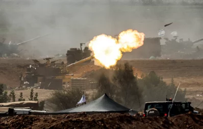  An Israeli army M109 155mm self-propelled howitzer fires rounds near the border with Gaza in southern Israel on October 12, 2023. Thousands of people, both Israeli and Palestinians have died since October 7, 2023, after Palestinian Hamas militants entered Israel in a surprise attack leading Israel to declare war on Hamas in the Gaza Strip enclave on October 8. Photo: AFP