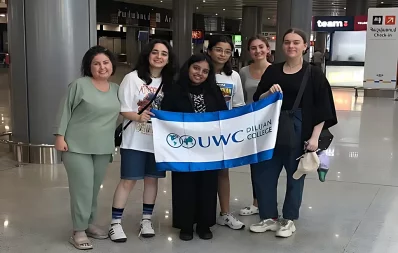 The image shows Tamanna, a student from JAAGO Foundation School, posing with her friends at United World College (UWC), Dilijan in Armenia. Photo: Courtesy