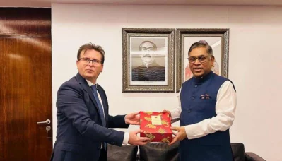 State Minister for Power, Energy, and Mineral Resources Nasrul Hamid and Turkish Ambassador to Bangladesh Ramis Sen pose for a photo after a courtesy meeting at the Secretariat on Sunday, October 22, 2023. Photo: Dhaka Tribune