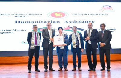 Foreign Minister Dr AK Abdul Momen hands over token humanitarian assistance to Ambassador of Palestine to Bangladesh Yousef SY Ramadan at a ceremony held at the Foreign Service Academy on Monday, October 23, 2023. Photo: Courtesy