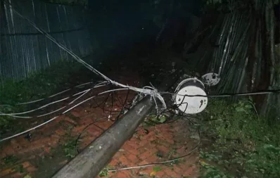 The image shows an electric pole uprooted due to Cyclone Hamoon in Chittagong on Wednesday, October 25, 2023. Photo: Dhaka Tribune