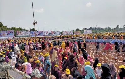 People gather for the public gathering, organized to celebrate the inauguration of South Asia`s first Bangabandhu Sheikh Mujibur Rahman Tunnel, at the KEPZ ground in Anwara upazila in Chittagong on Saturday, October 28, 2023. Photo: Dhaka Tribune