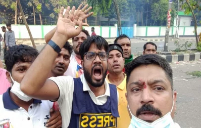 Image shows Rabiul Islam Nayan wearing a vest written “press” on it. Photo: Bangla Tribune