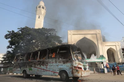 The image shows the bus of &ldquo;Shikor Paribahan&rdquo; being torched in front of the south gate of Baitul Mukarram in Dhaka on Sunday morning, October 29, 2023. Photo: Mehedi Hasan/ Dhaka Tribune