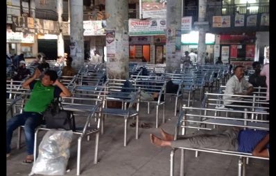 The image shows some passengers waiting at a bus counter in Saidabad, Dhaka, on Wednesday, November 1, 2023. Photo: Dhaka Tribune