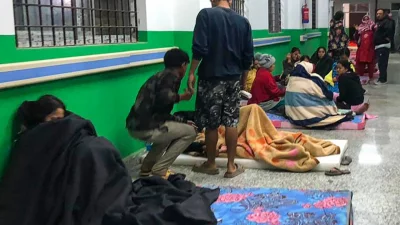 Survivors are seen at a corridor of the Jajarkot district hospital in the aftermath of an earthquake in Jajarkot on November 4, 2023. Photo: AFP