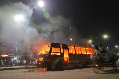 A bus of `Dishari Paribahan` is set on fire in Tatibazar intersection in Old Dhaka on Wednesday night, November 9, 2023. Photo: Mehedi Hasan/Dhaka Tribune