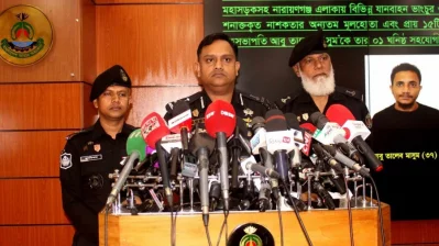 Commander Khandaker Al Moin, director of legal and media wing of RAB, responds to queries from journalists at a press conference organized at RAB Media Centre in Karwan Bazar in the capital on Saturday afternoon, November 18, 2023. Photo: Bangla Tribune