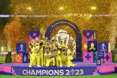 Australia players celebrate with the World Cup trophy after winning Sunday’s final against India in Ahmedabad Photo: AFP