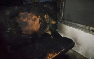A train is set ablaze in the Ishwardi Junction Railway Station in Pabna on Monday, November 27, 2023. Photo: Dhaka Tribune 