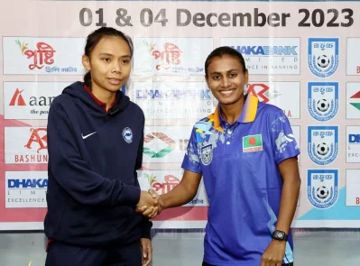 Bangladesh skipper Sabina Khatun shakes hands with Singapore captain Rosnani Azman