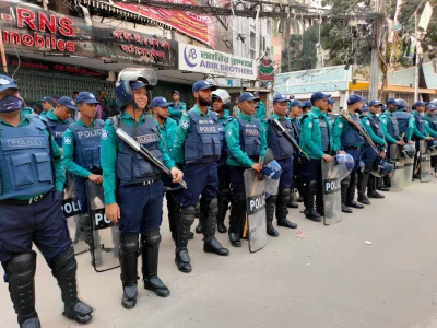 Members of Bangladesh Police stand guard in front of BNP`s Central Office in Naya Paltan on Saturday, December 16, 2023. Photo: Mahmud Hossain Opu/Dhaka Tribune
