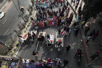 The image shows a glimpse of a symbolic road march program held in Dhaka on Saturday protesting recent arson attacks, December 23, 2023. Photo: Mahmud Hossain Opu/Dhaka Tribune