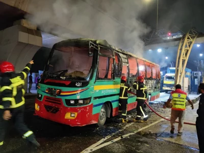The image shows the aftermath of the Rajnigandha Paribahan bus torched in Dhaka’s Gulistan area on Saturday night, December 23, 2023. Photo: Fire Media Cell