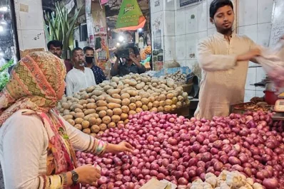 Buyers buying food essentials from a retail shop in Chittagong. Photo: Dhaka Tribune