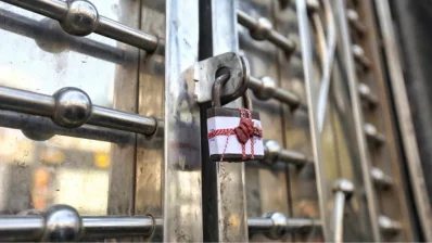 A lock hangs at the gate of the Nightingale View building in Khilgaon, Dhaka, which was sealed off on Tuesday, March 5, 2024. Photo: Ahadul Karim Ahad/Dhaka Tribune