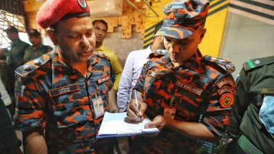 Officials of the Fire Service and Civil Defence during a raid at the Nightingale View building in Khilgaon, Dhaka on Tuesday, March 5, 2024. Photo: Ahadul Karim Ahad/Dhaka Tribune