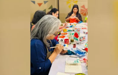 An artist is seen painting during rickshaw art workshops in Dhaka on Sunday, March 10, 2024. Photo: Courtesy
