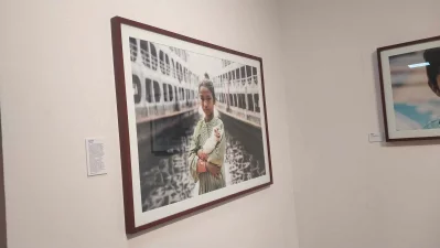 The image shows a portrait of a street child at an exhibition on street children at Bangladesh Shilpakala Academy. Photo: Dhaka Tribune